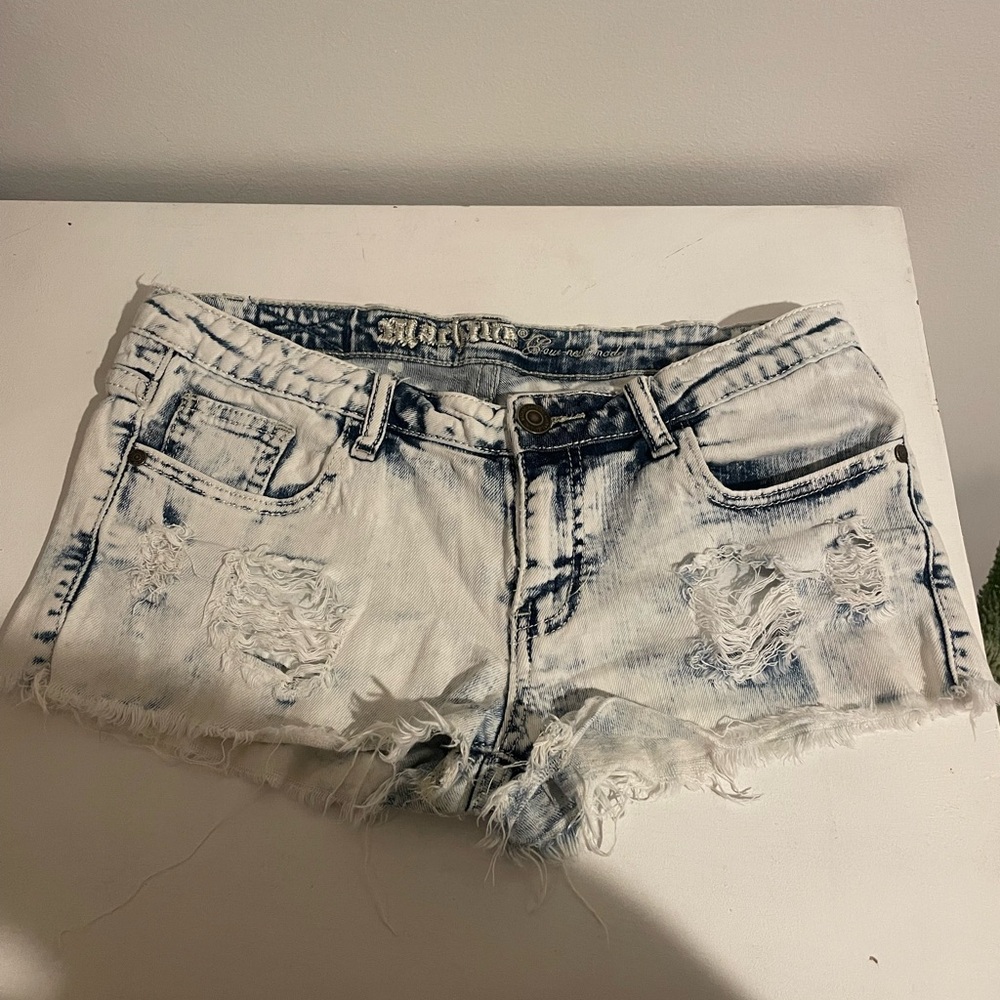 Distressed denim shorts